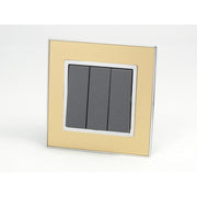 Gold Mirror Glass Single Frame with dark grey insert of 3 gang light switch