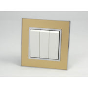 Gold Mirror Glass Single Frame with white insert of 3 gang light switch